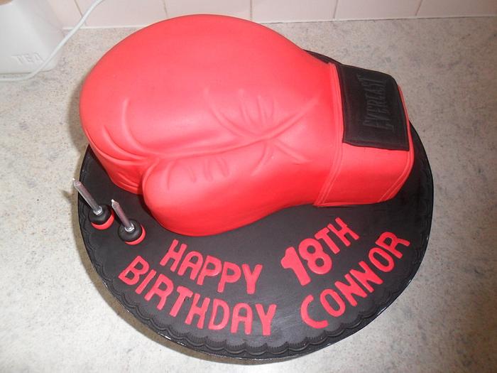 red boxing glove birthday cake