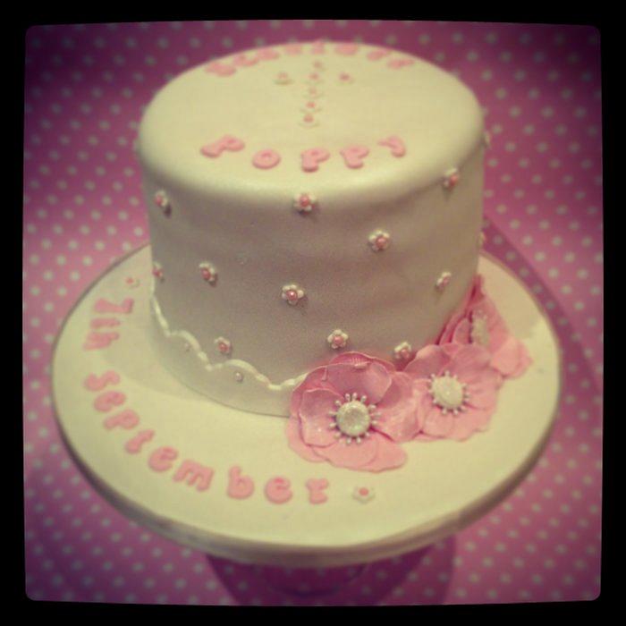Pink and ivory christening cake with a surprise inside