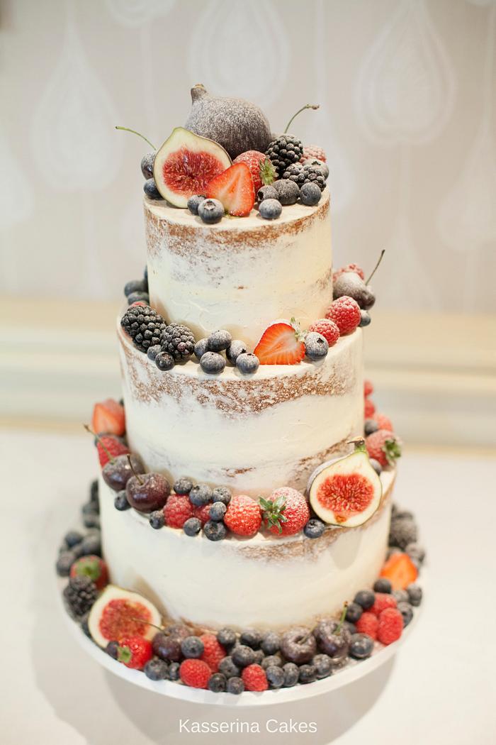 Semi-naked wedding cake with fruit
