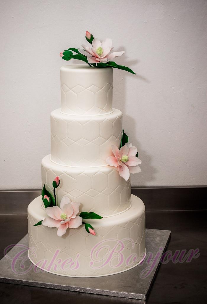 Magnolia wedding cake.