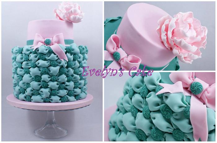  cake with pillows, buttons and flower