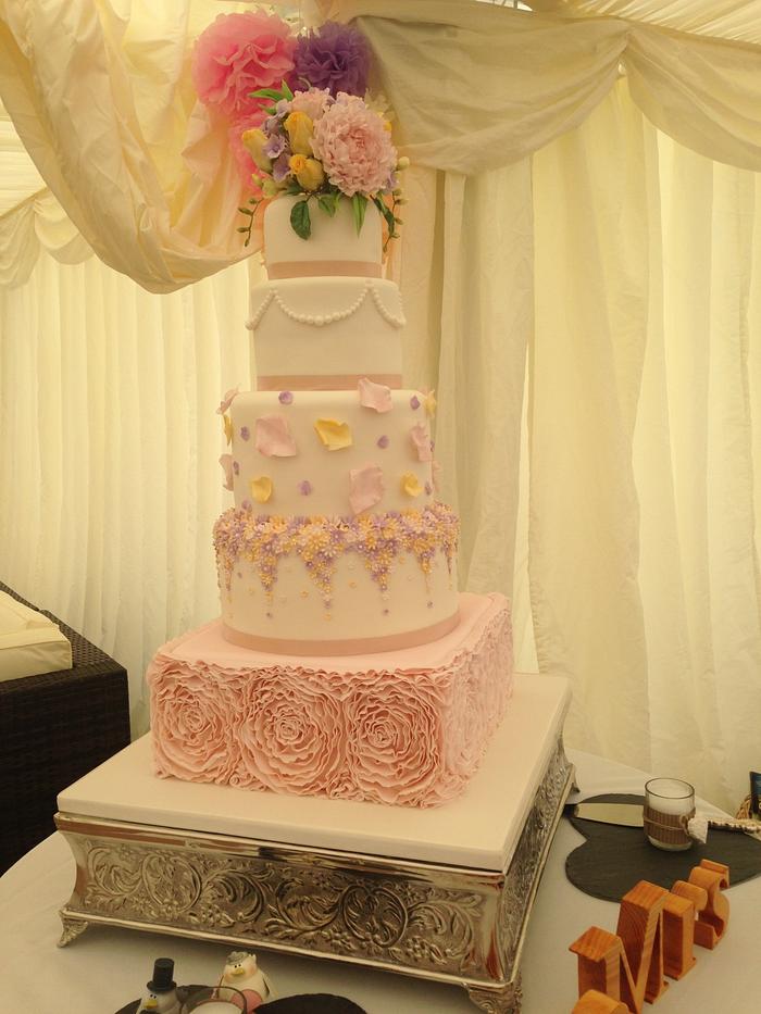 5 tier pastels and ruffles wedding cake