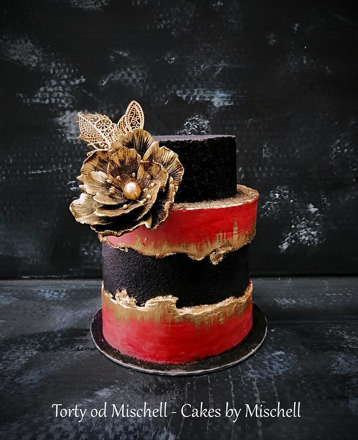 Black - red - gold cake