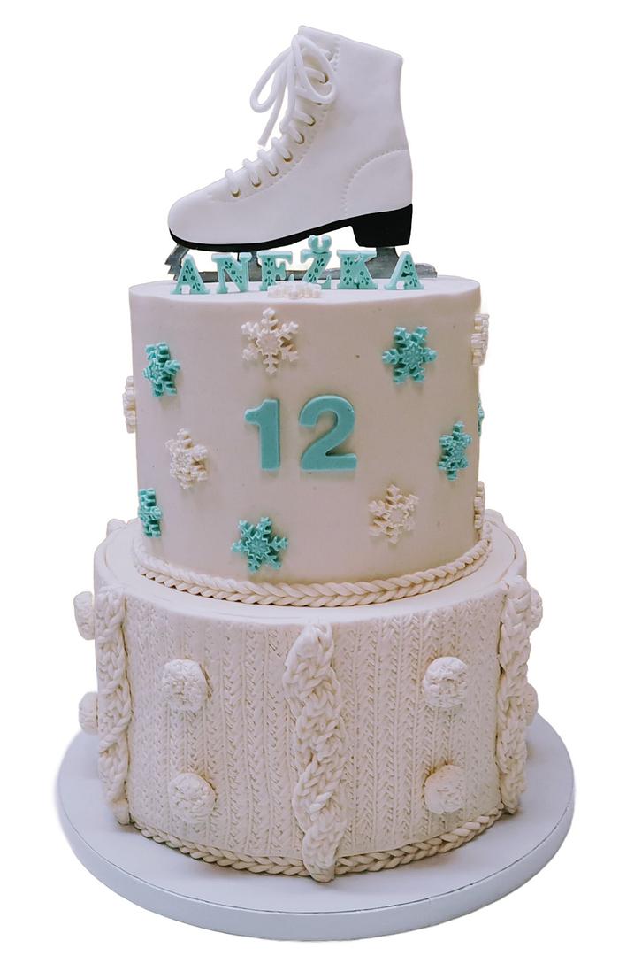 Two-tiered cake for a figure skater