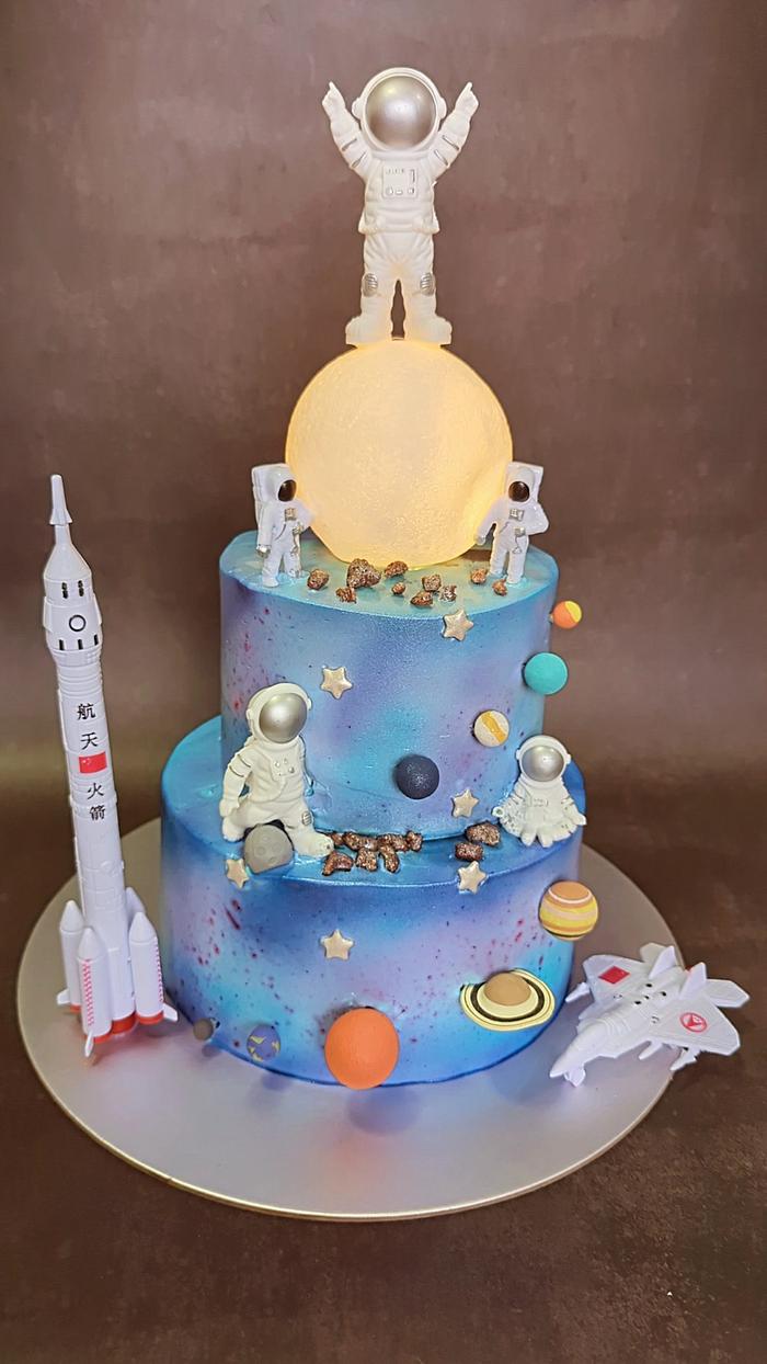 Glowing moon space theme cake
