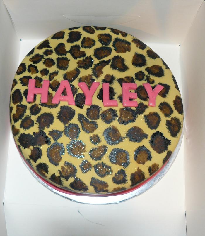 Hand painted leopard print cake. 