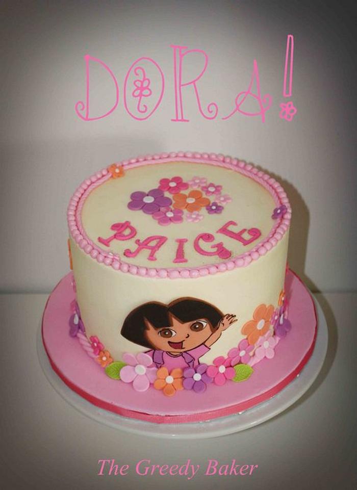 Dora buttercream cake with fondant accents