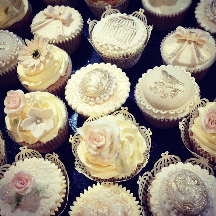 Ivory and gold wedding cupcakes