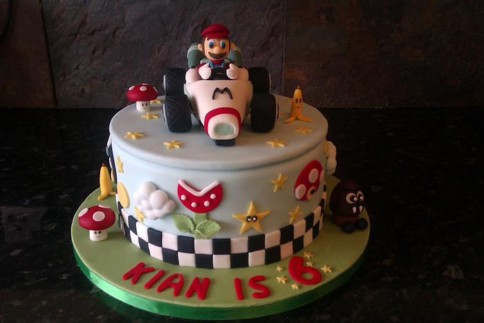 mario brothers, cake. All decorations including figure and kart made from gumpaste.
