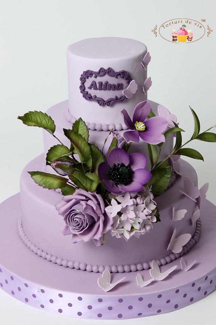 Purple cake with purple flowers