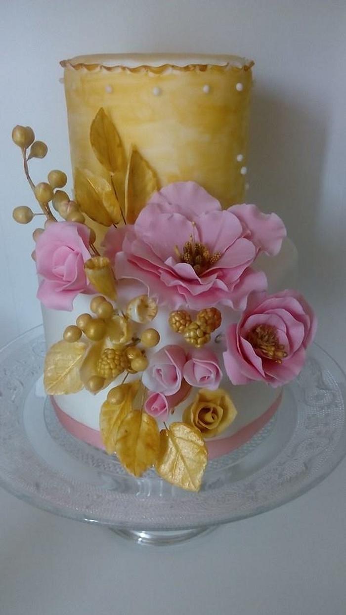 Vintage pink and gold wedding cake
