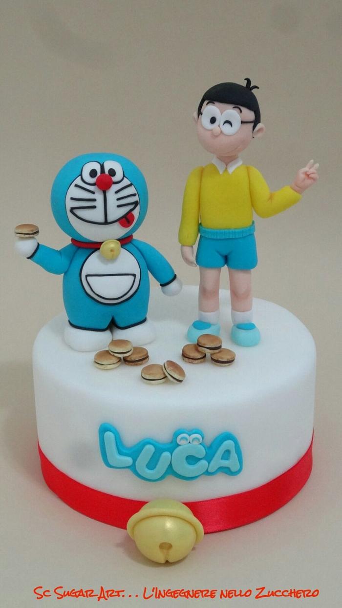 Vanilla Bloom - A Doraemon themed Vanilla cake baked to order for Sukanya,  for her son's birthday. Making cartoon characters isn't my forte. Most of  the times you will find me refusing