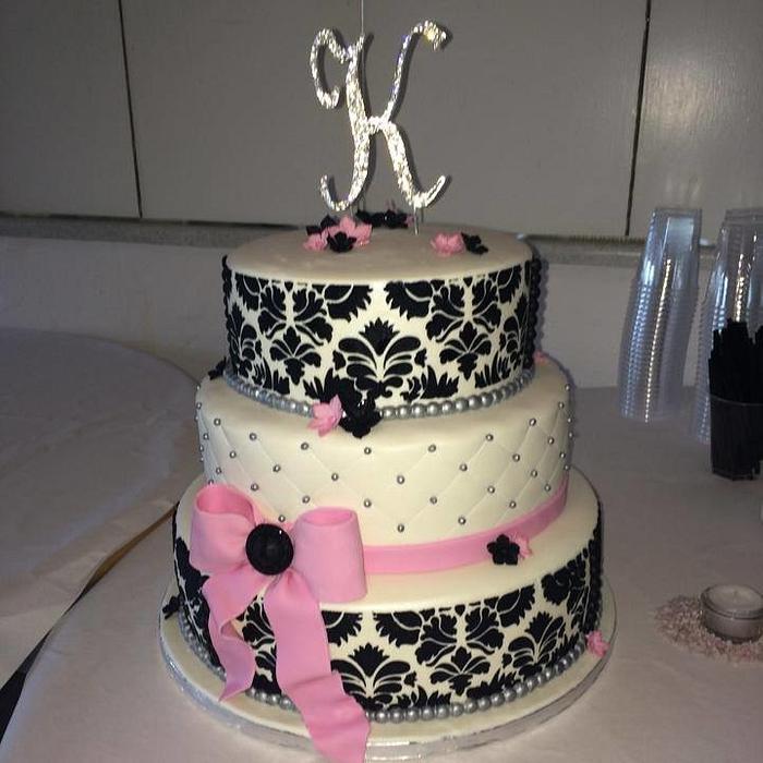 Cake with damask stencil large K with rhinestone and bow