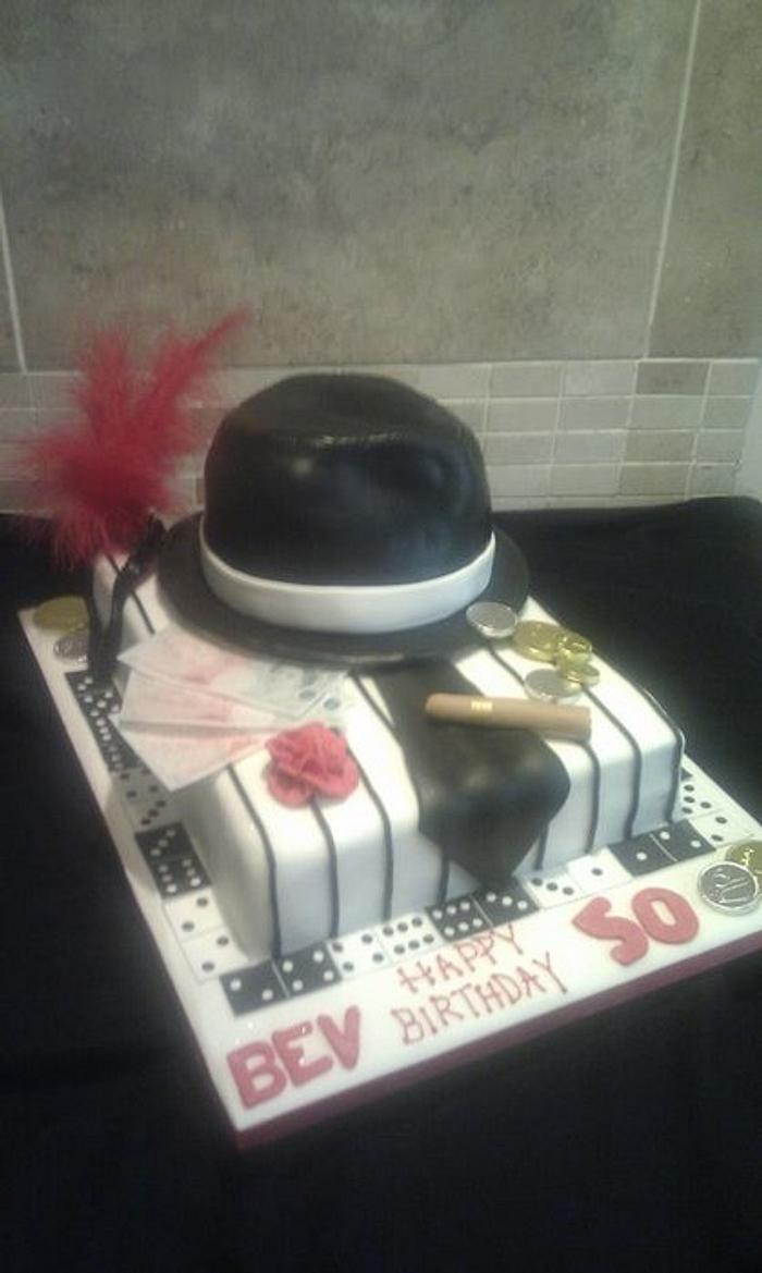 Gangster and Molls themed cake with Trilby cake top tier! 