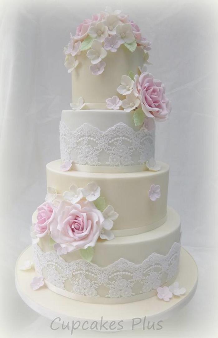 Pink roses and lace wedding cake