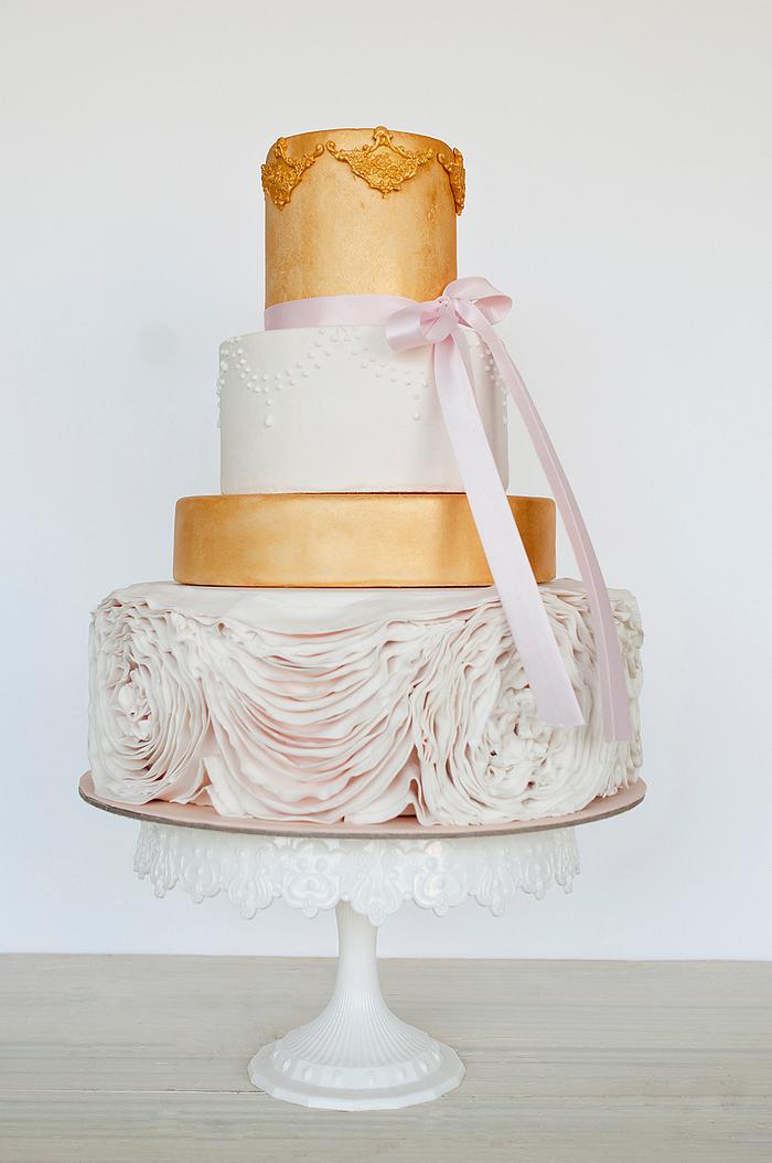 Gold and ruffles wedding cake