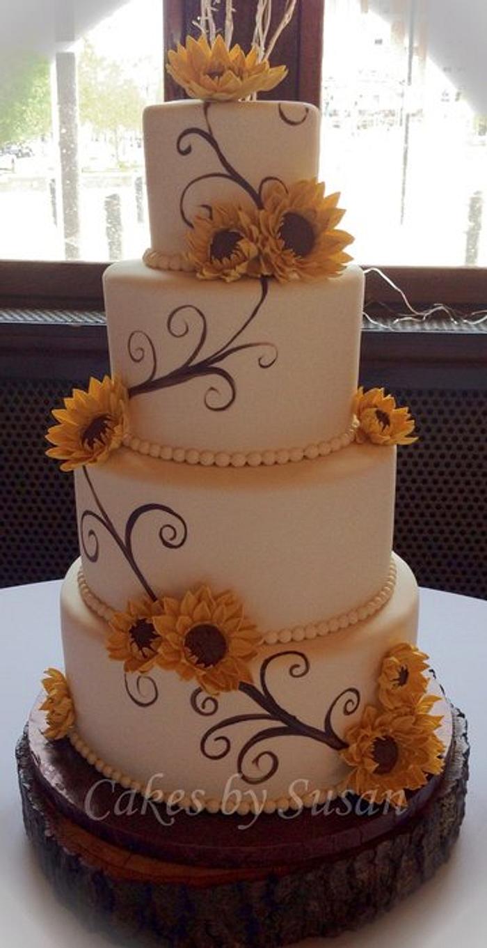 Hand painted sunflower wedding cake 