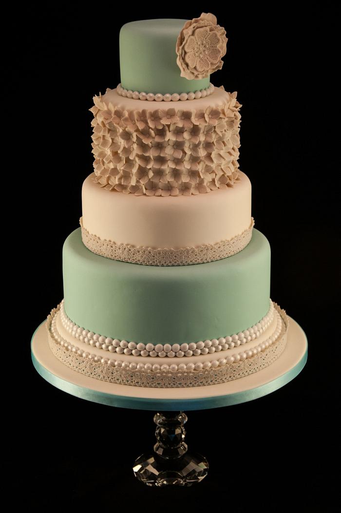 Crochet lace, hydrangea and pearl wedding cake