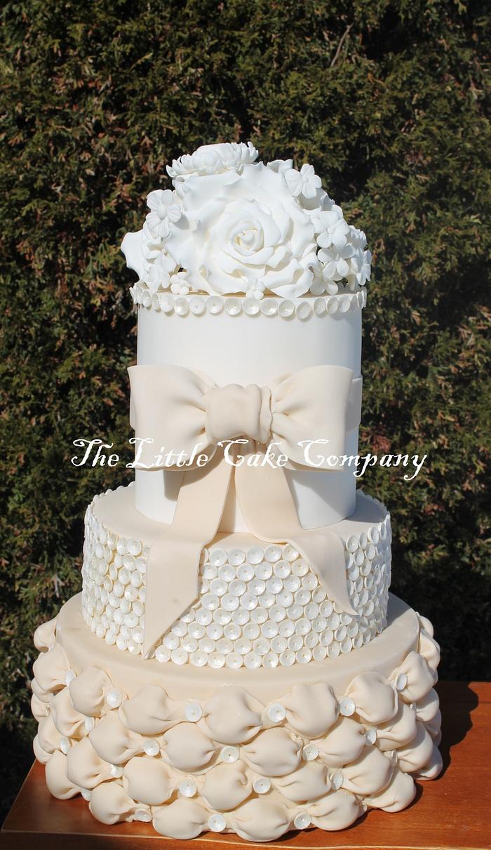 pretty ivory wedding cake