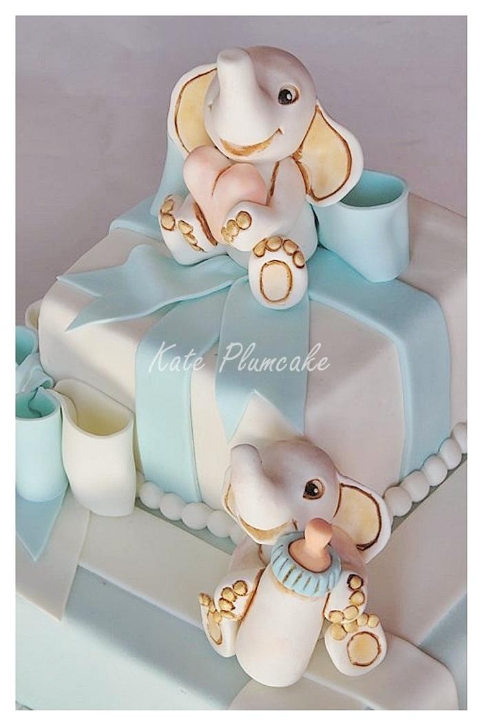 Christening cake with baby elephants