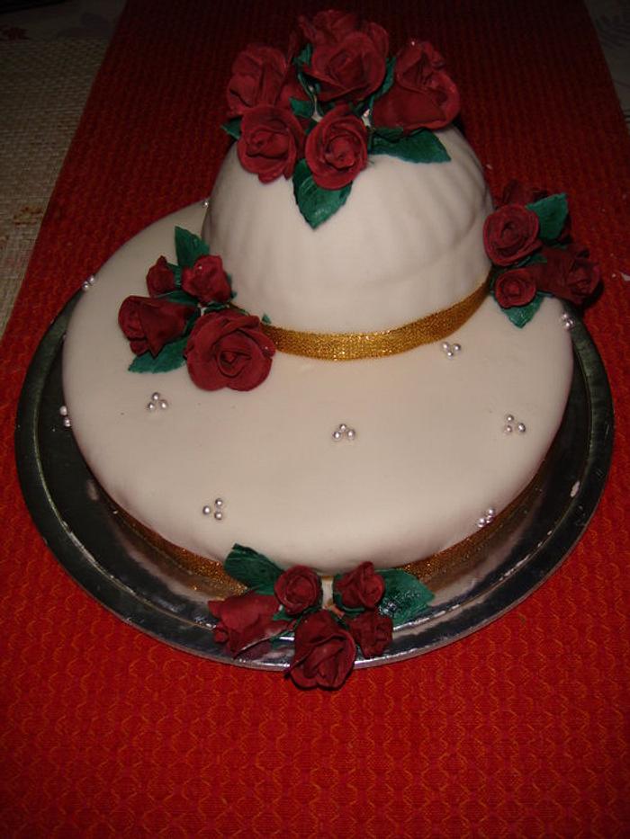 My first fondant cake and hand made Roses
