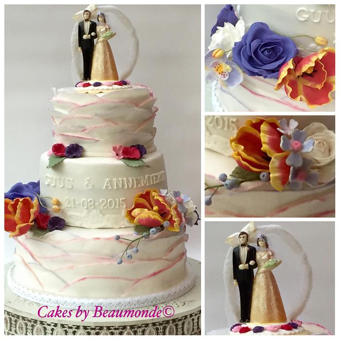 Red velvet wedding cake with vintage cake topper