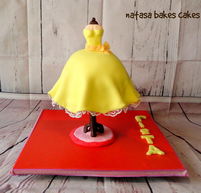 vintage dress gravity defying cake