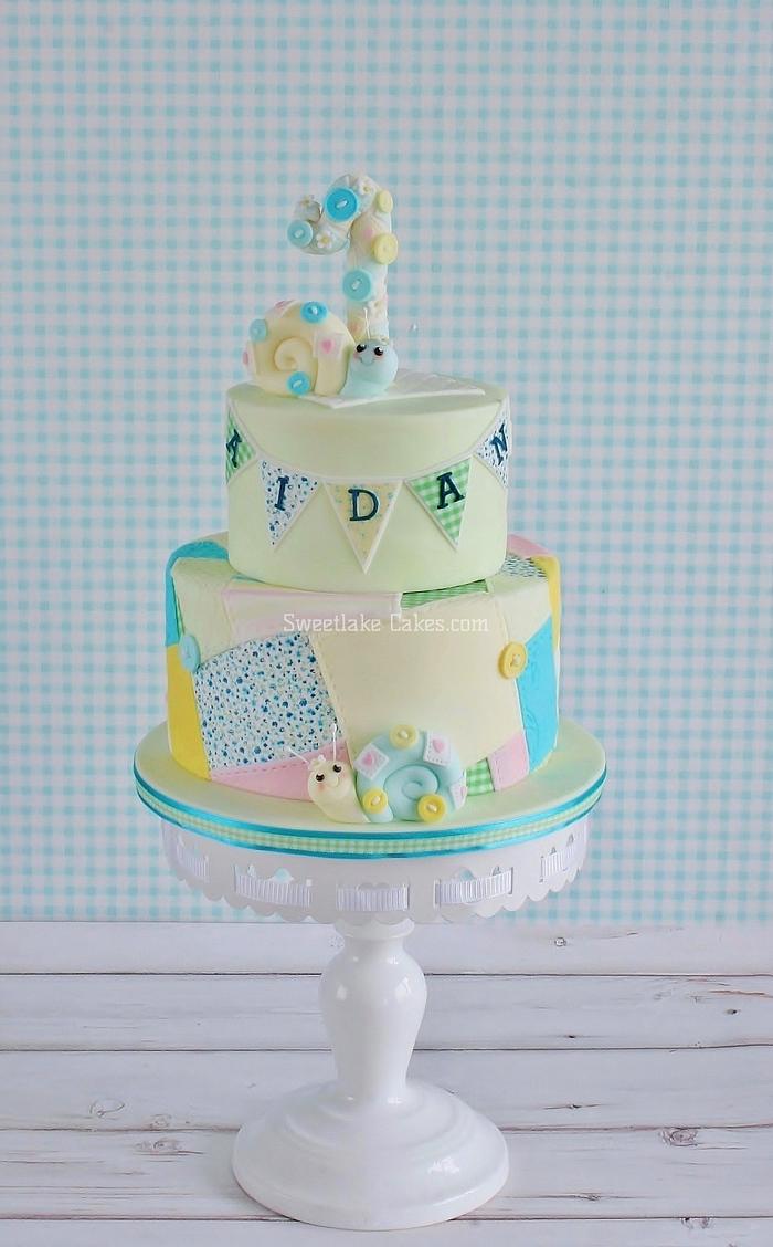 Patchwork cake with cute snails