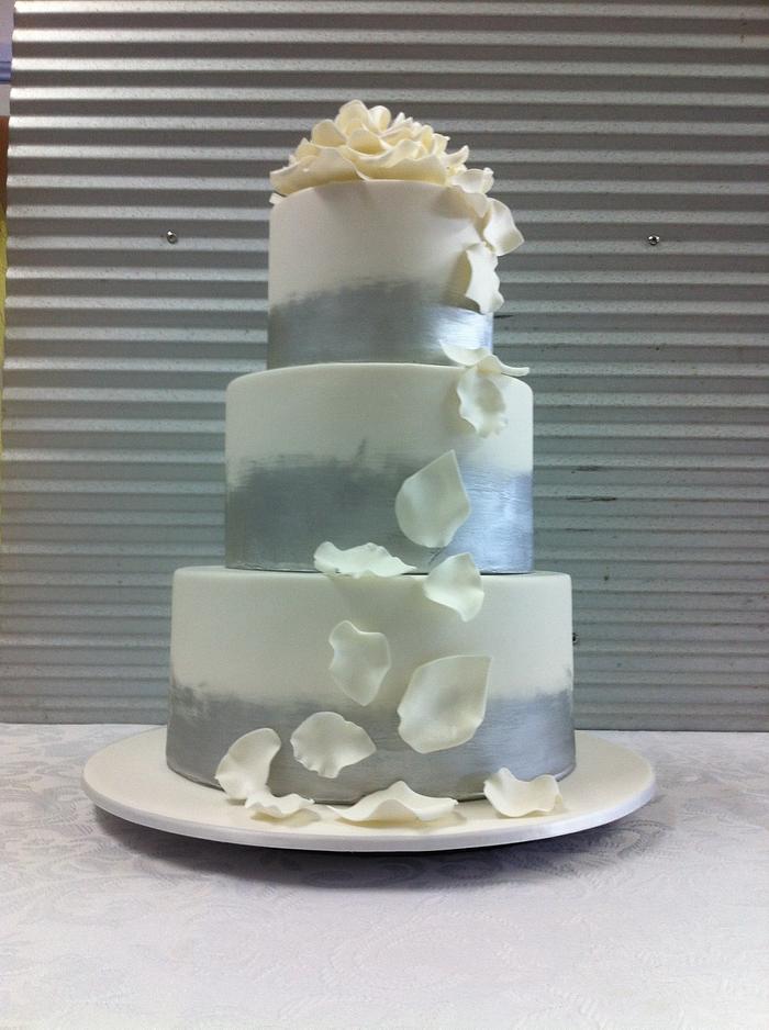 Silver cascading rose petal wedding cake 