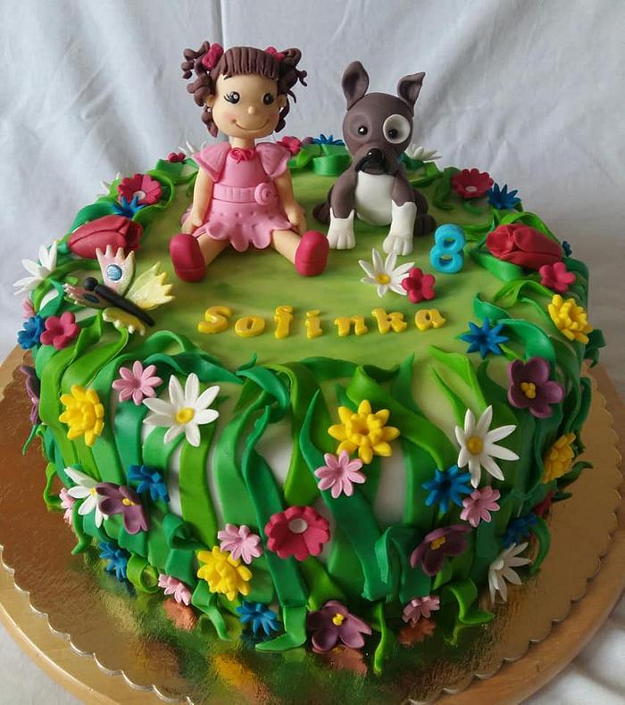 Cake with little girl and her dog