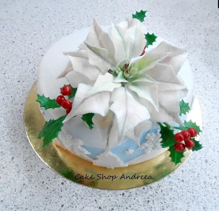 white poinsettia cake