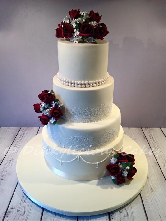 Ivory and burgundy wedding cake