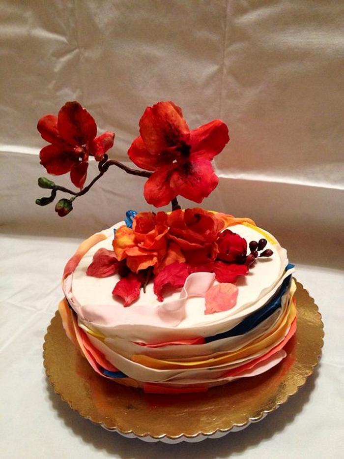 small cake with orchids
