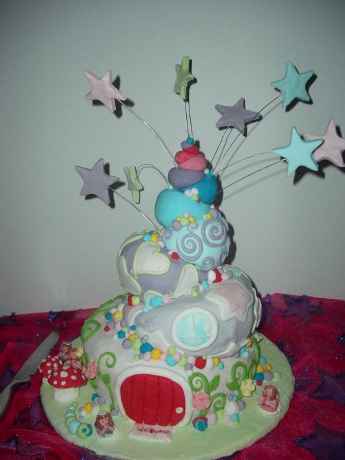 Topsy turvy fairy house cake