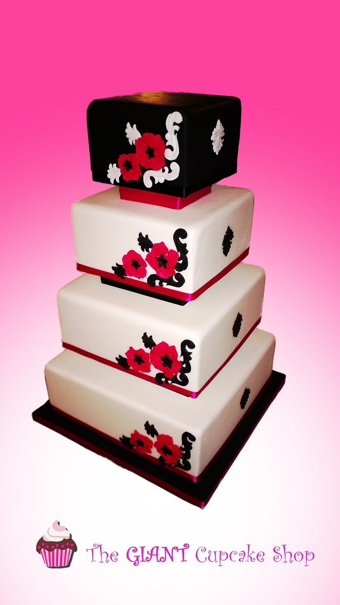 Black and pink 4 tier wedding cake