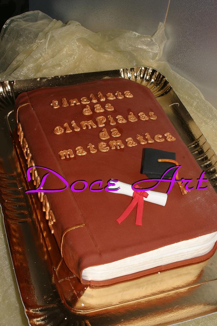 Graduation book cake 