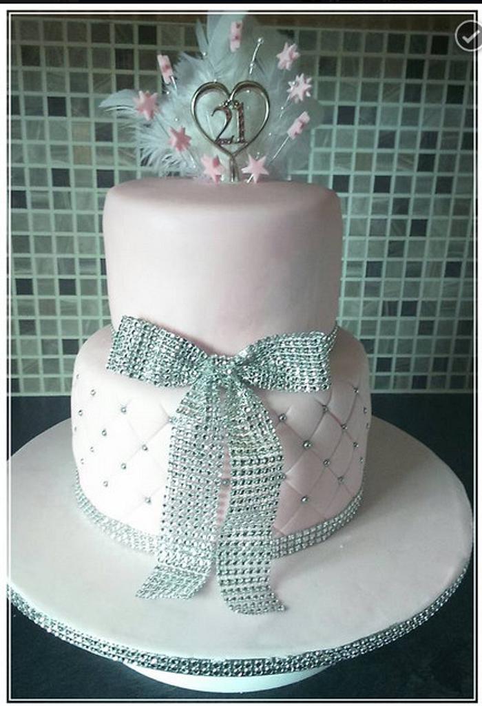21st cake with diamonte ribbon and feathers 