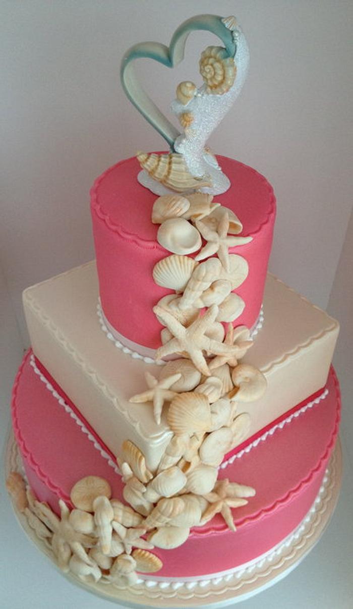 Watermelon/Ivory seashell wedding cake