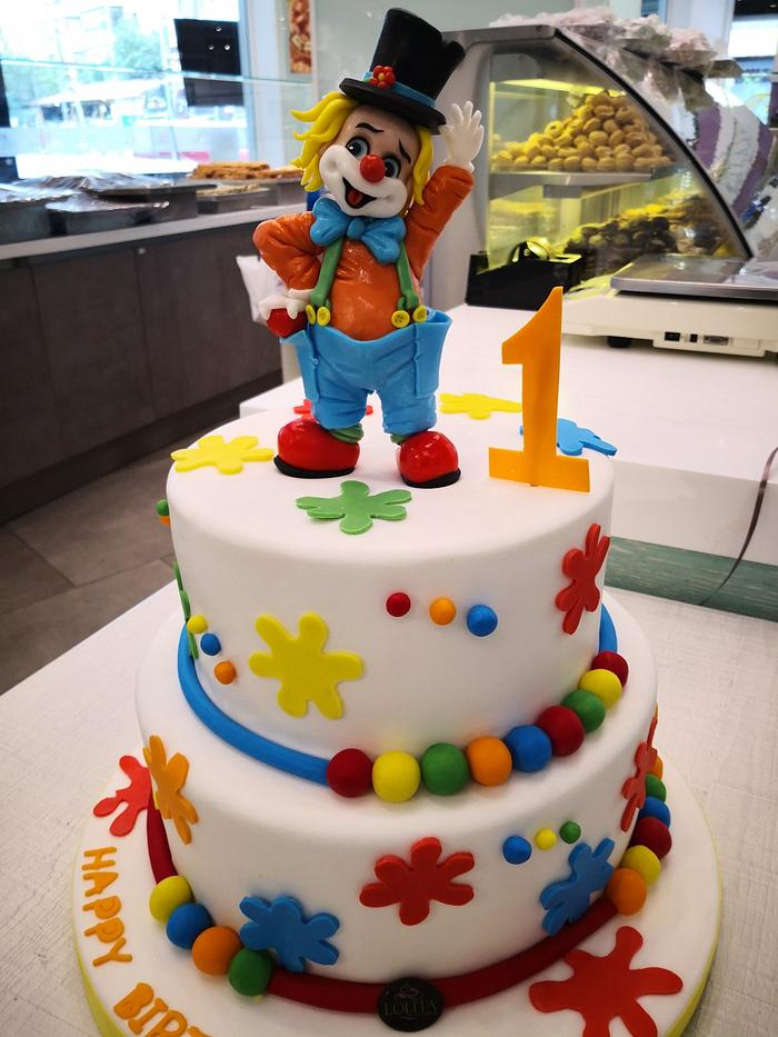 Clown topper cake