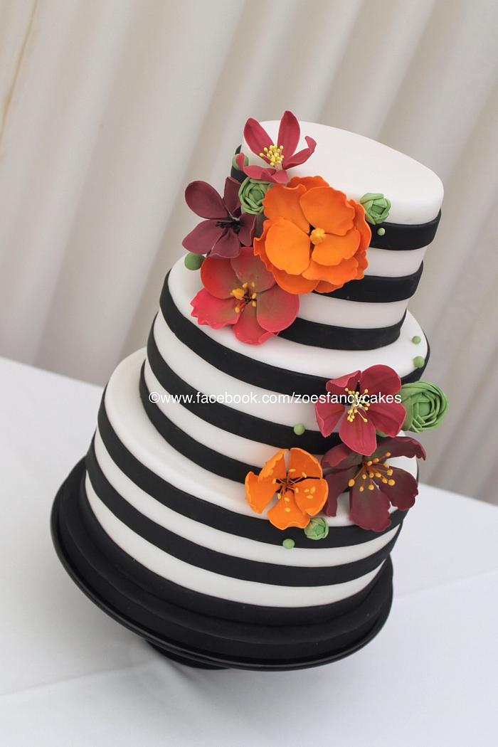 Black and white striped wedding cake