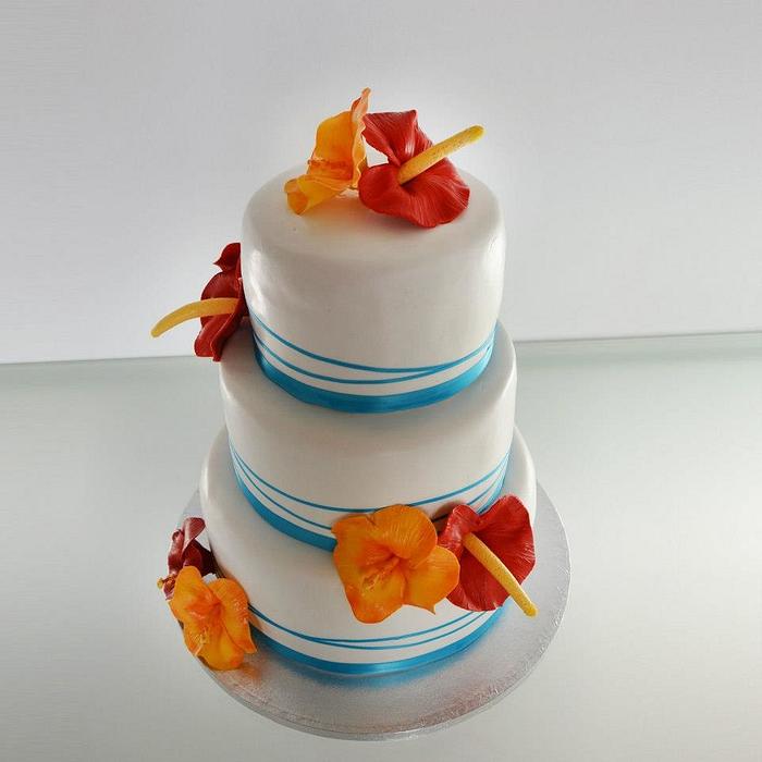 Hibiscus and anthurium wedding cake