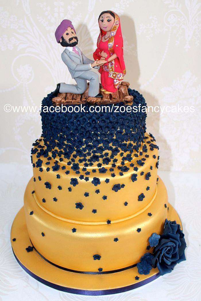 The finished gold and navy Indian wedding cake