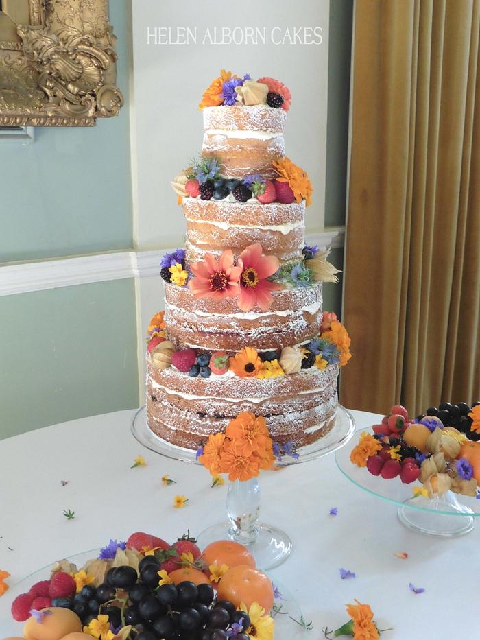 Naked wedding cake with edible flowers