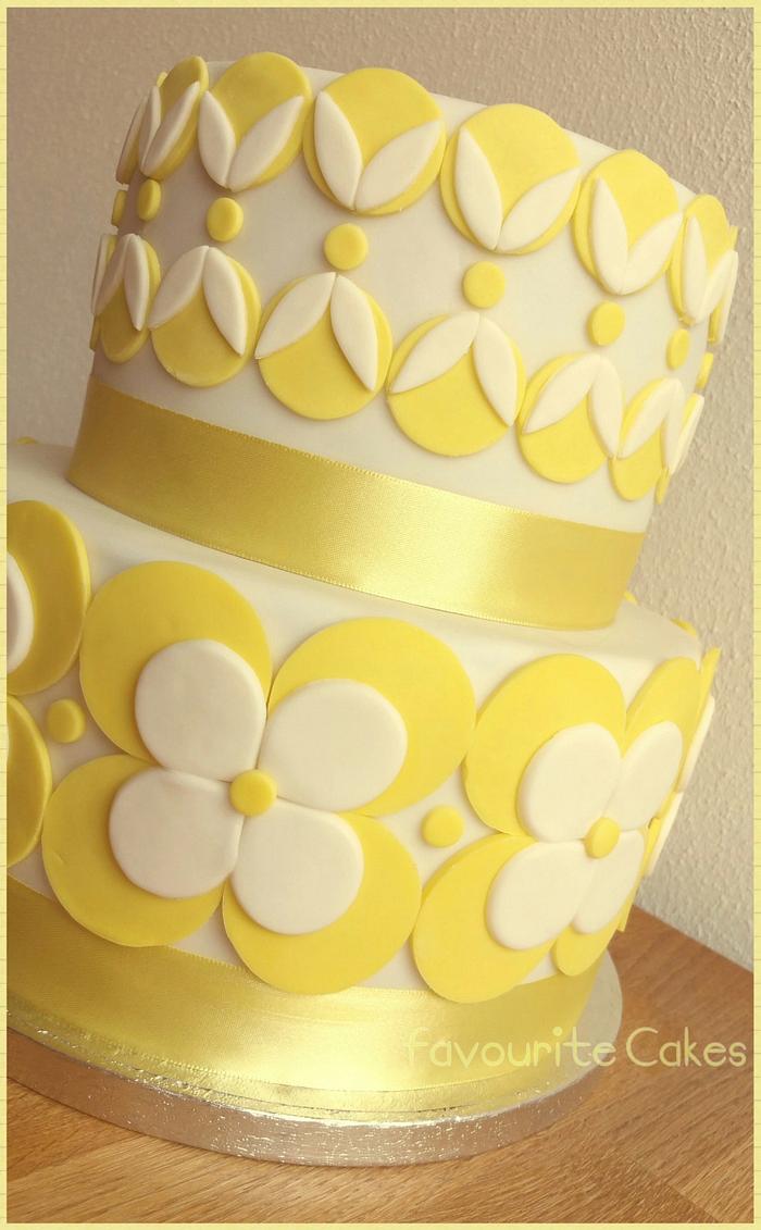 white and yellow flower cake