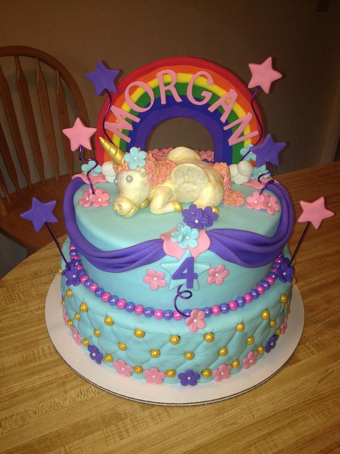 Rainbow unicorn tiered cake