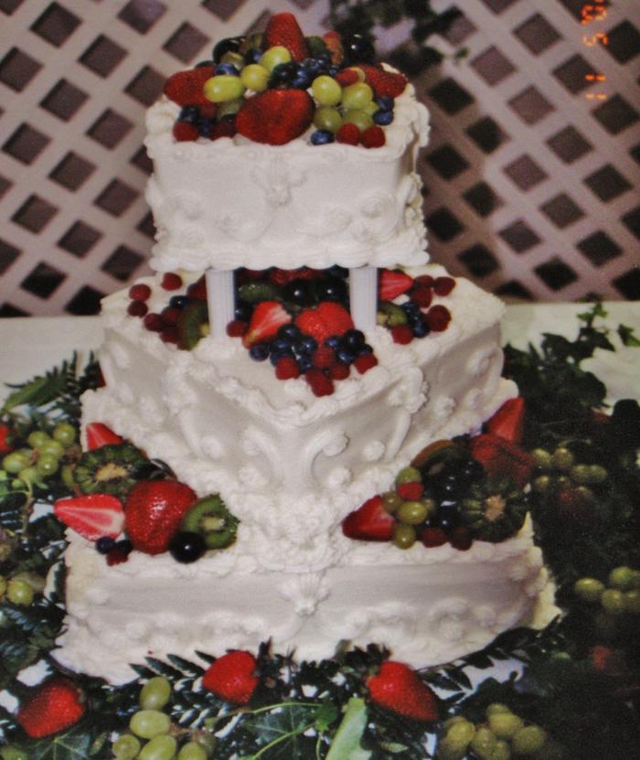 Square wedding cake with fresh fruit