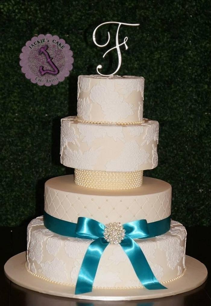 Vintage ivory lace wedding cake