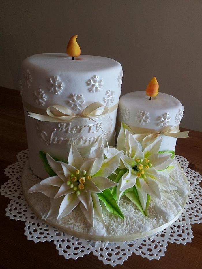 Christmas candle cake with white poinsettia 