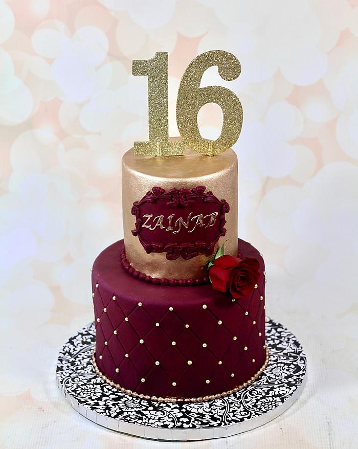 Gold and burgundy wedding cake - Decorated Cake by Icing - CakesDecor