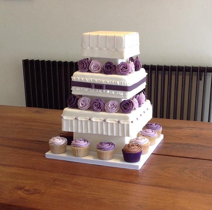 Ivory and purple wedding cake.